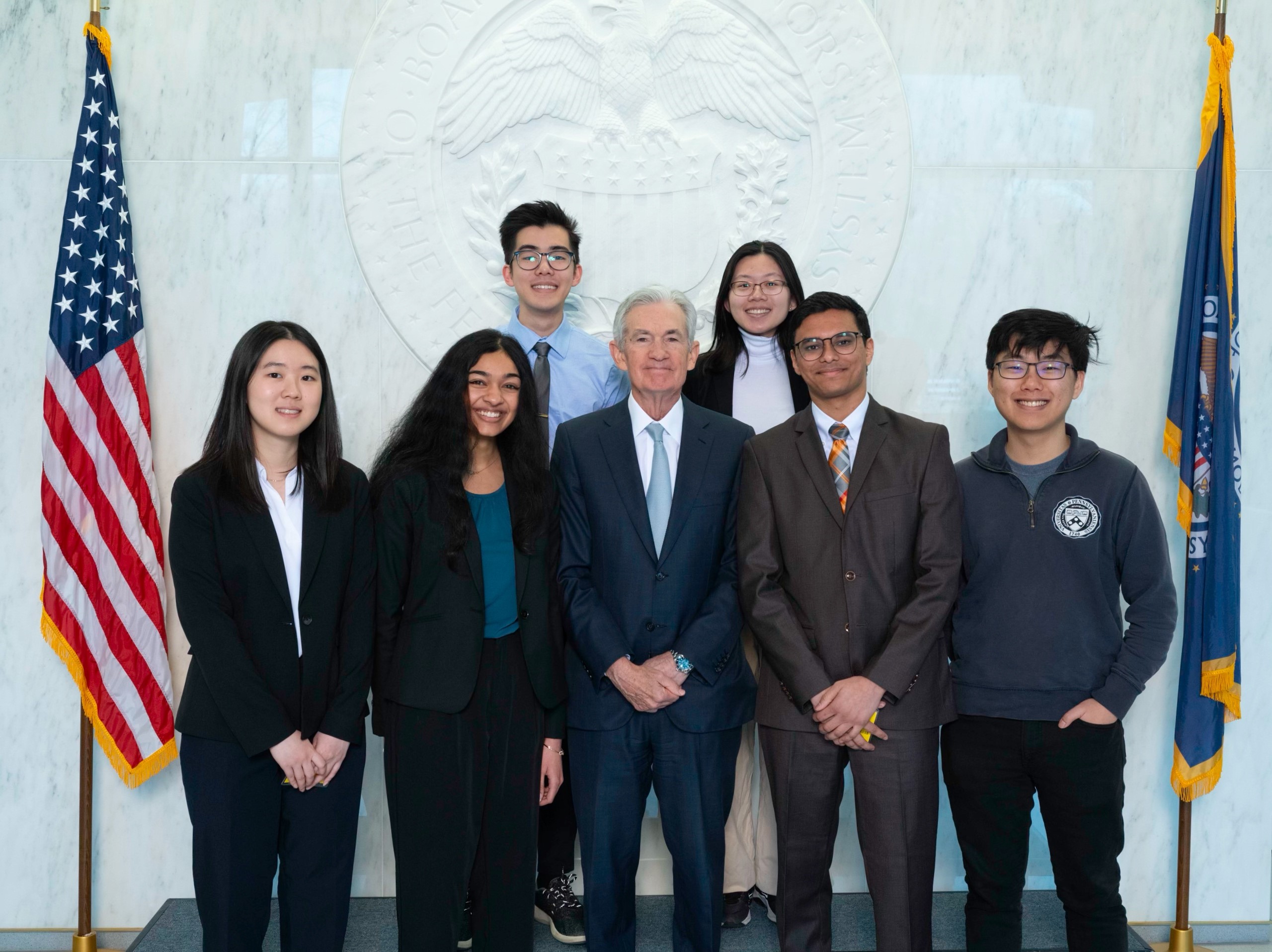 The 2023 Penn Fed Challenge team poses with Federal Reserve Chair Jerome Powell.