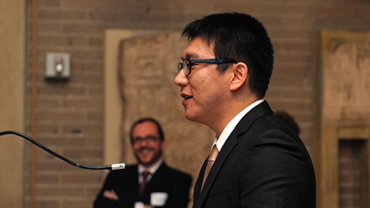 Chamna Yoon accepts the Maloof Family Dissertation Fellowship in Economics.