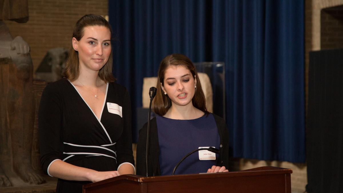 Students presenting the Irving B. Kravis Prize for Distinction in Undergraduate Teaching